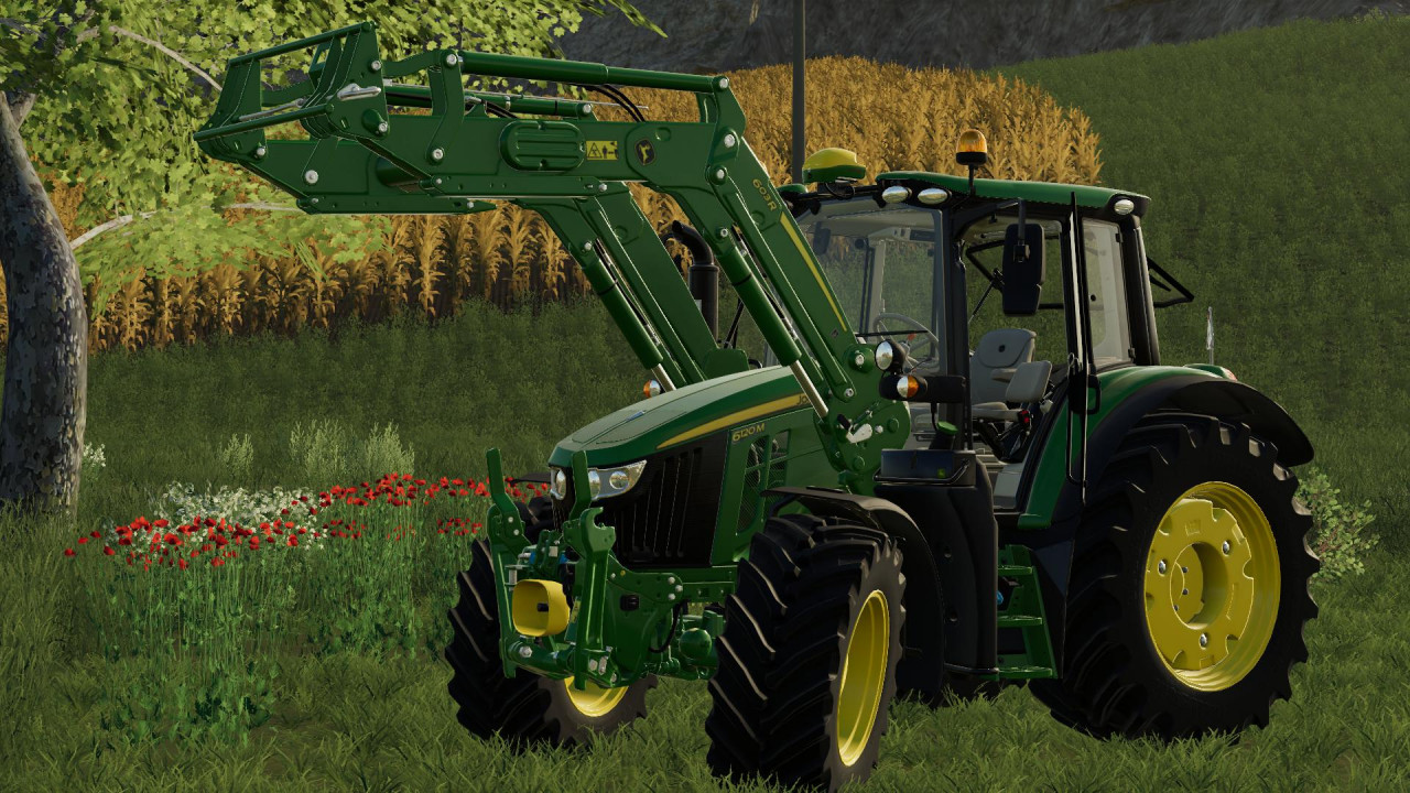John Deere 6M Series with 603R front loader